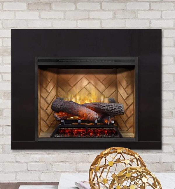 photo of dimplex revillusion 24 inch fireplace insert with black metal trim kit installed in a light colored brick fireplace opening