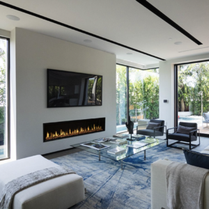 a modern flames orion multi 100 inch electric fireplace in a living room under a large tv